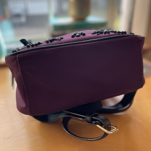 Kate Spade Wilson Road Bradley Backpack plumb with black embellishments - Picture 11 of 16